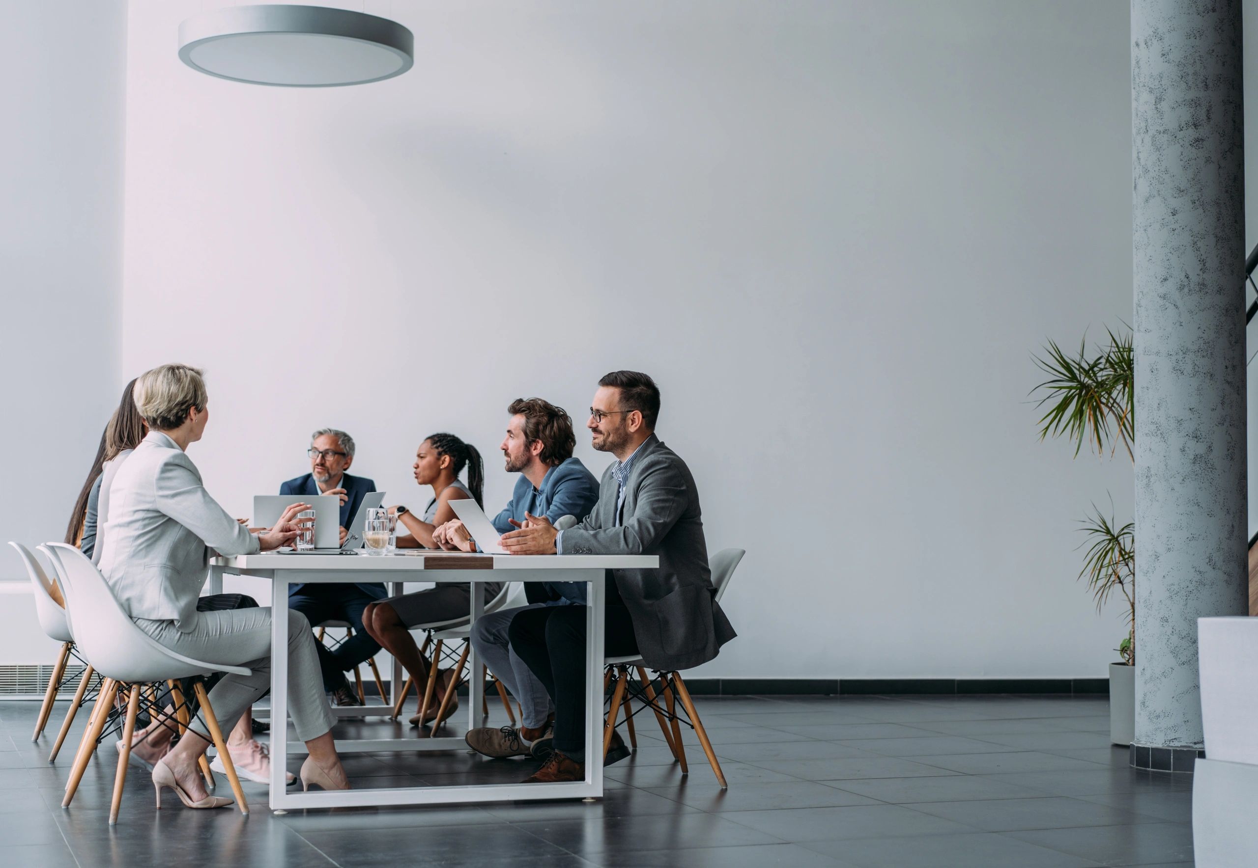 Business team collaborating during a client strategy meeting